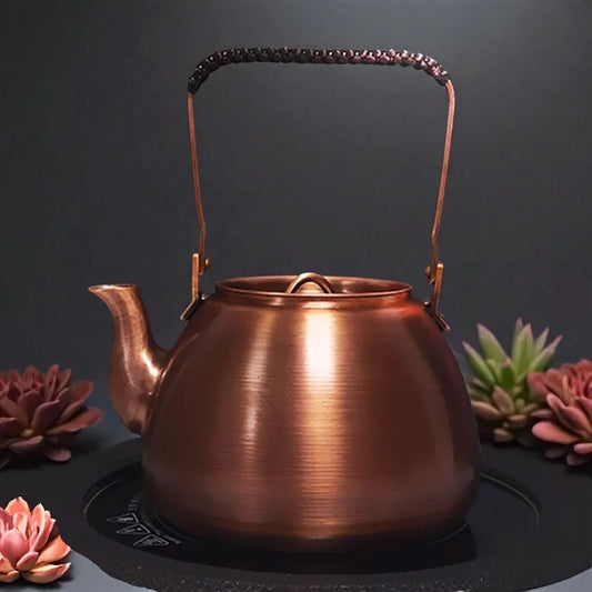 Théière en cuivre violet 1,2L – Artisanale, poêle ronde