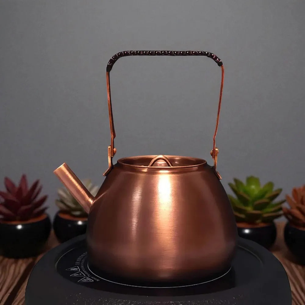Théière en cuivre violet 1,2L – Artisanale, poêle ronde