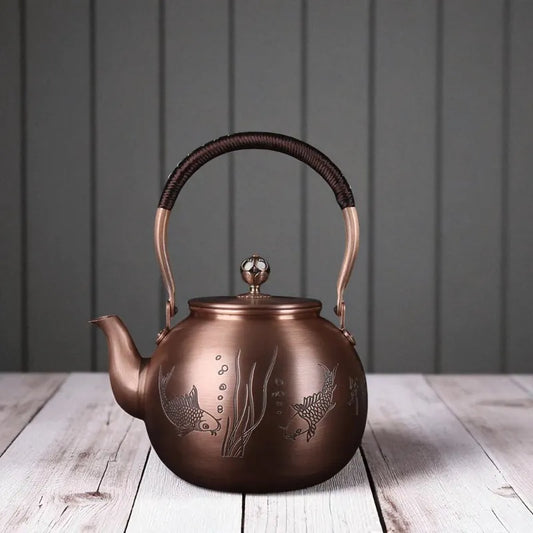 Théière en cuivre violet 1,5L – Motif herbes